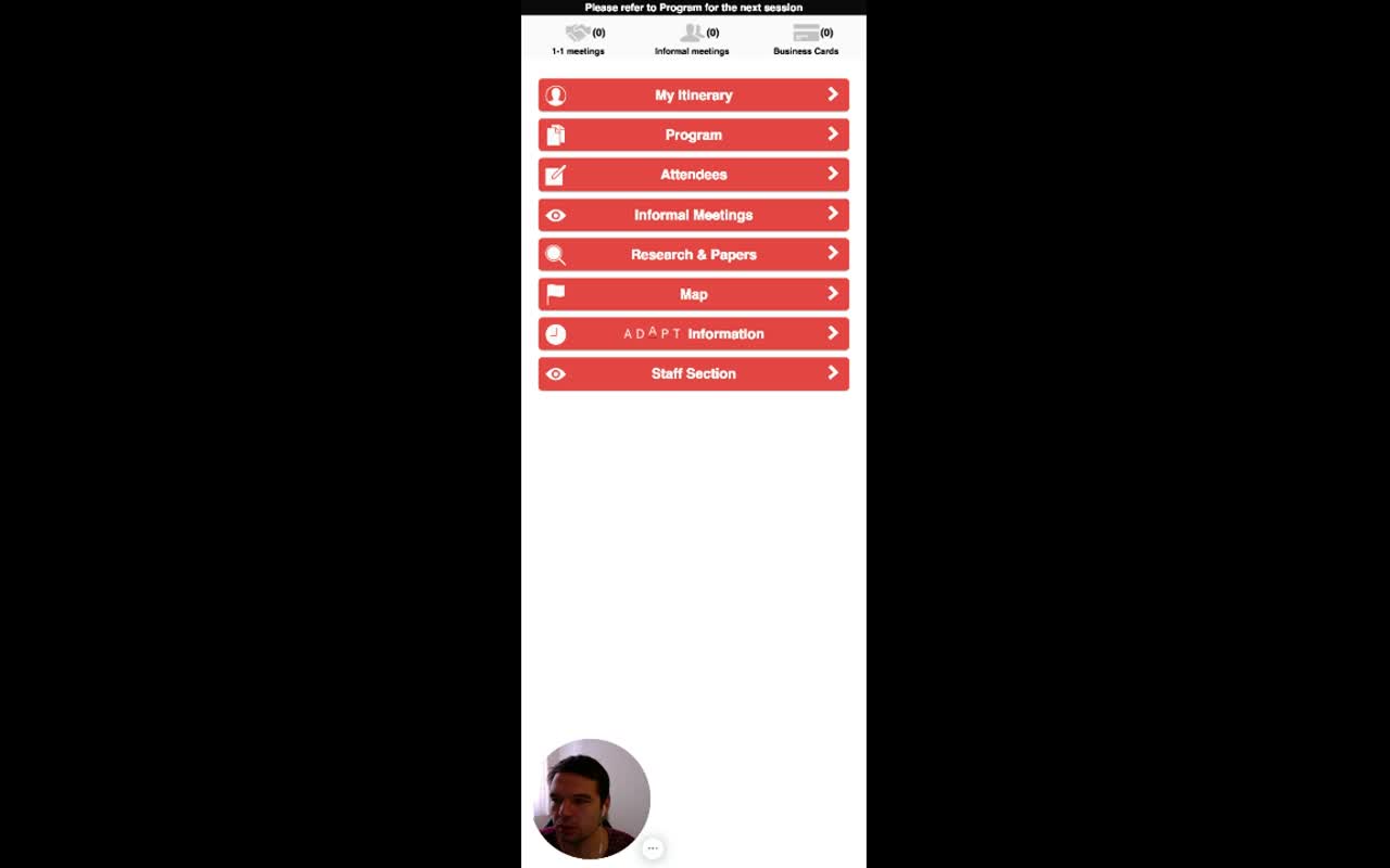 Mobile main menu with a 'Please refer to Program for the next session' notification at the top, three icon counters (1-1 meetings 0, Informal meetings 0, Business Cards 0), and eight large red buttons: My Itinerary, Program, Attendees, Informal Meetings, Research & Papers, Map, [Vendor] Information, Staff Section
