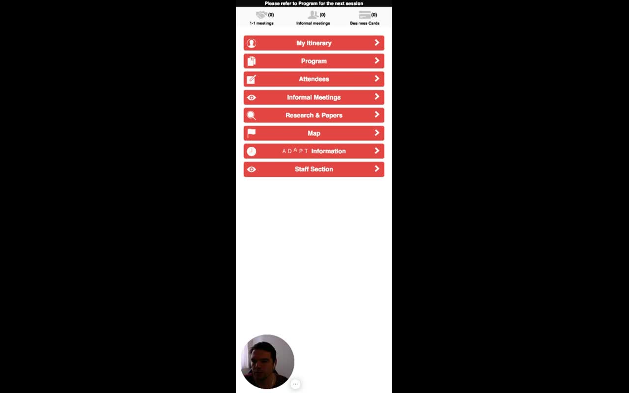 Mobile main menu — Please refer to Program for the next session notification at the top, three counters (1-1 meetings 0, Informal meetings 0, Business Cards 0), and eight large red buttons: My Itinerary, Program, Attendees, Informal Meetings, Research & Papers, Map, Information, Staff Section