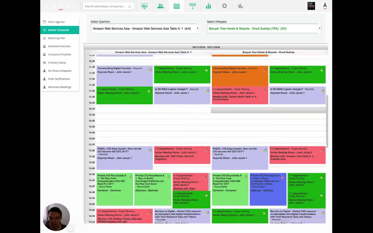 Master Scheduler with two columns side by side — Amazon Web Services Asia Table A: 1 on the left and Banyan Tree Hotels & Resorts (Vinod Sukhija) on the right; both columns show their schedule color-coded by session type (purple Keynotes, green/pink 1-1 Appointments showing 'Meeting with X', light green Roundtables, blue session); time runs vertically from 10:50 to 16:30+
